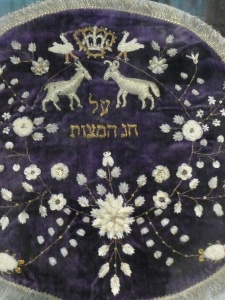 Matzah Bag, detail, (late 19th century), metallic thread, sequins, beads and fish scales from Girls’ Orphan Home, Jerusalem Courtesy Derfner Judaica Museum