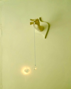Hanging by a Thread, plaster relief by Dorene Schwartz-Weitz Courtesy: Response Art Series